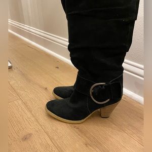 Black boots with a small wooden heel